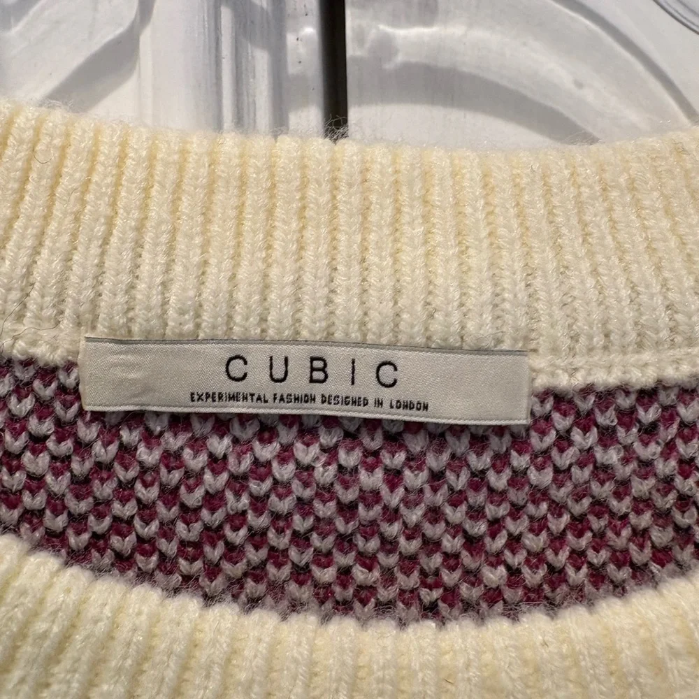 Cubic Cream Sweater with Black and Pink Graphic
